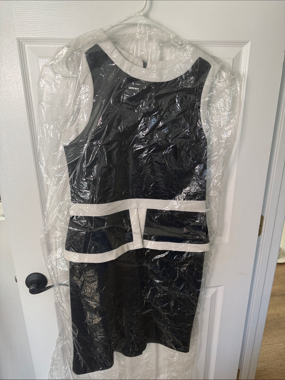 Shelby & Palmer Black and White Sleeveless Peplum Sheath Dress
